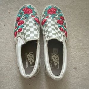Checkerboard vans slip ons with roses
